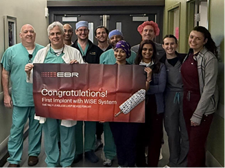 Healthcare professionals celebrate milestone.