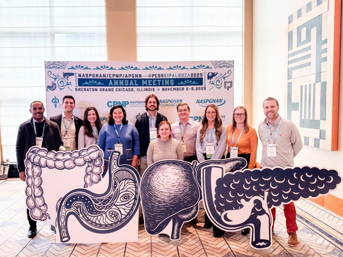 Gastro section stands behind conference sign