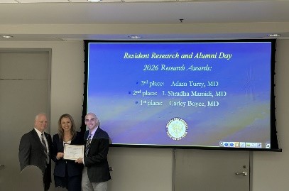 Dr. Carley Boyce accepts award.
