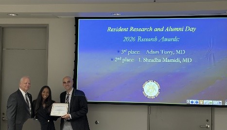 Shardai Mamidi accepts award