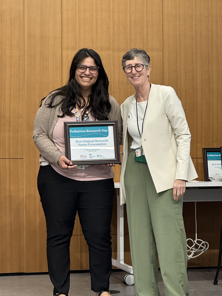 Dr. Trivedi accepts award.