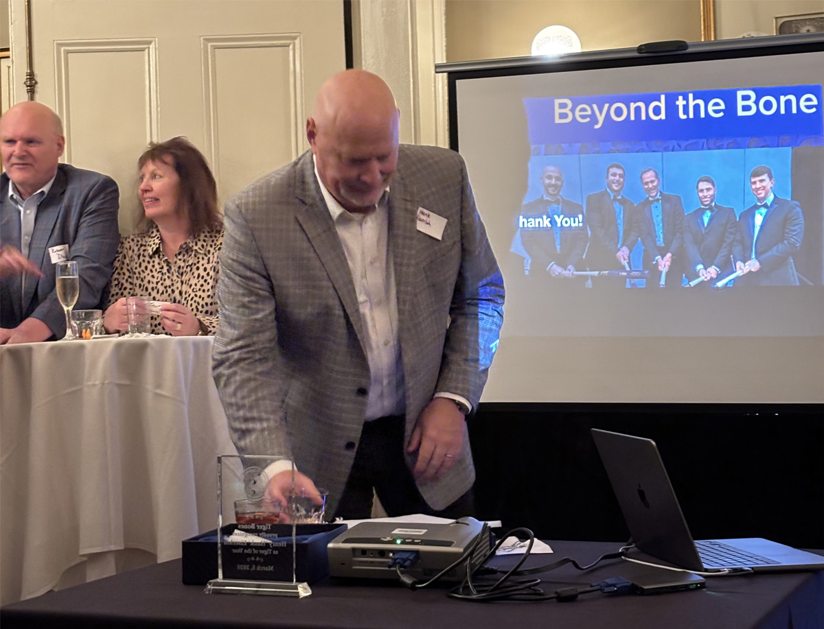 LSU Ortho Tiger Bones Event 2026 Hank Eiserloh at Podium