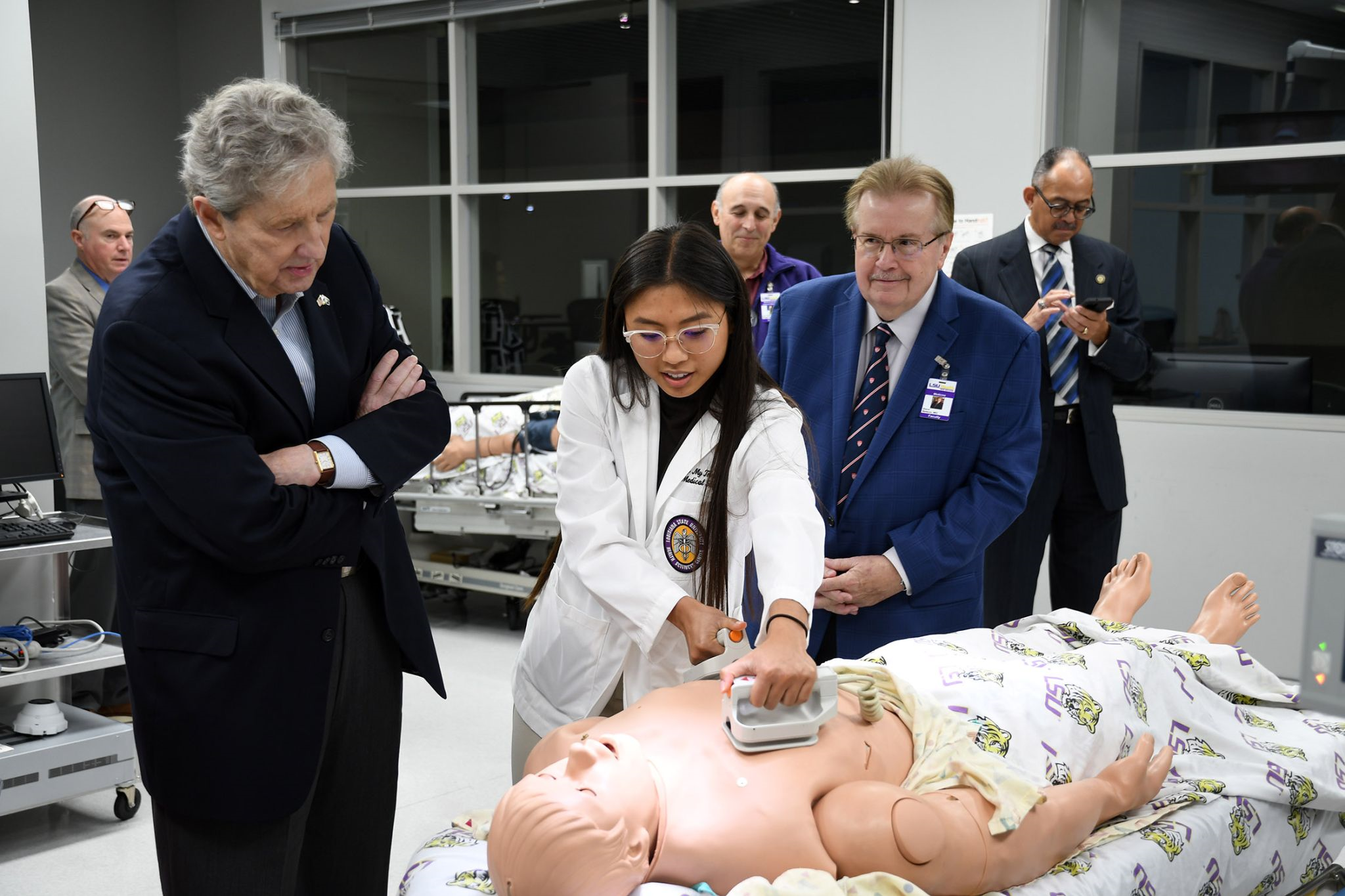 Sen. Kennedy watches simulated patient care