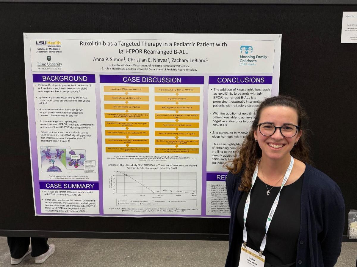 Dr. Simon near her poster