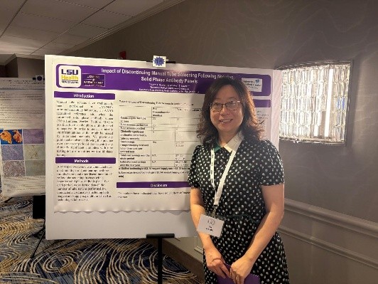 Dr. Liu with her poster
