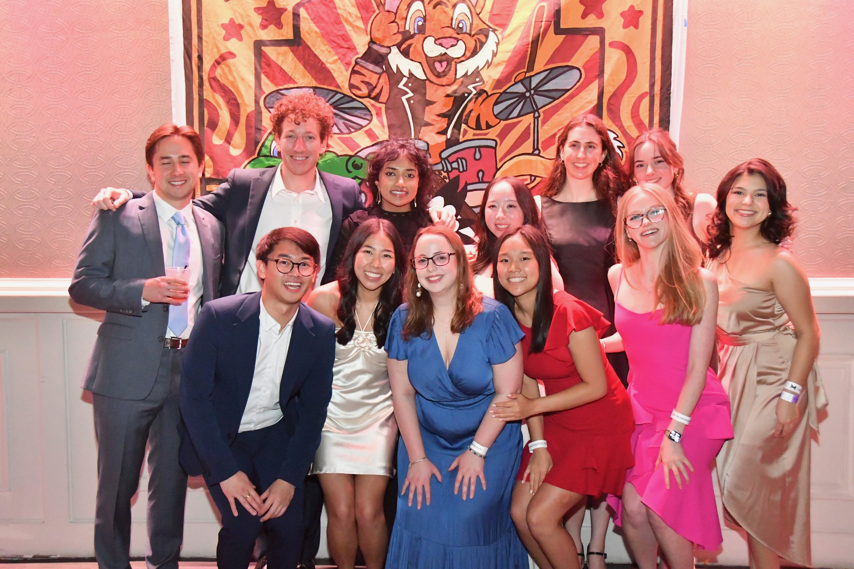 A large group of gala attendees pose