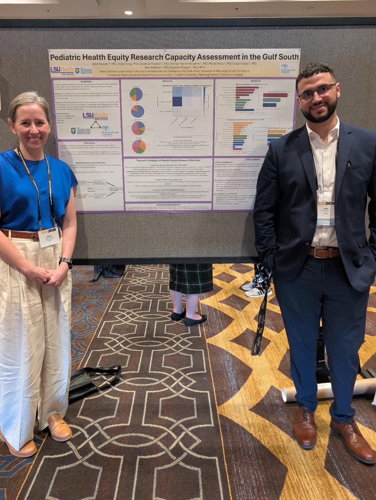 Drs. Shalabi and Phelps with poster